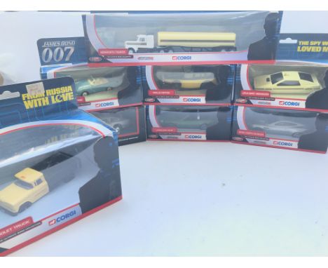 A Box Containing a Collection of Corgi James Bond Vehicles. All boxed.