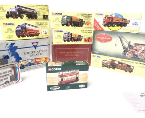 A Case Containing a Collection of Corgi Clasics including Buses.Brewery Lorryâ€™s. Etc.