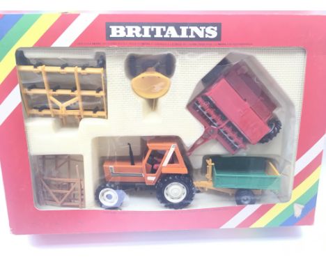 A Boxed Britainâ€™s Fiat Tractor and Implement set #9591.