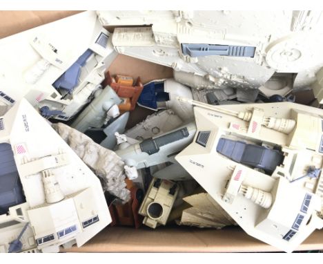 A Box ContainImg a Collection of Vintage Star Wars Ships. Including the Falcon.Snow Speeder Slave 1 and various Mini Rigs. Al