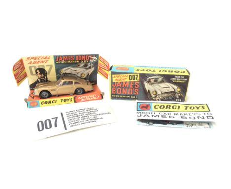 A Boxed Corgi James Bond Aston Martin D.B.5 #261. With Secret Instructions (Sealed) and Check List (un ticked).