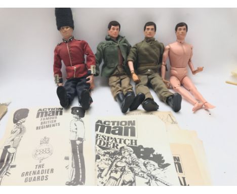 A Collection of 4 Vintage Action men including a Grenadier Guard (With Manual) and a Collection of Manuals etc.