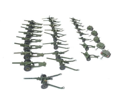 A Large Collection of Playworn Dinky Field Guns.