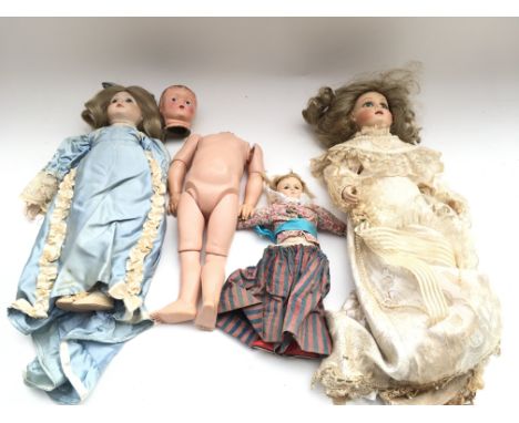 Collection of vintage dolls.