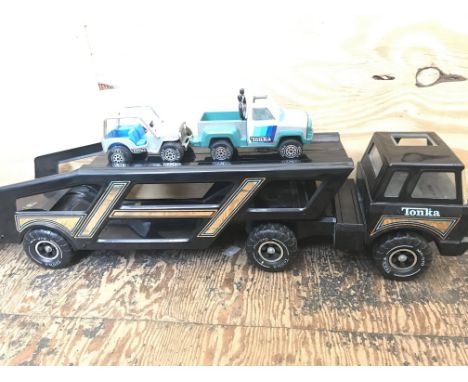 A Vintage Tonka Car Transporter with Vehicles.