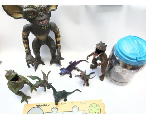 A Large Plastic Gremlin, a Pot of Plasic Zoo Animals and 3x Vintage Fisher price Puzzles.