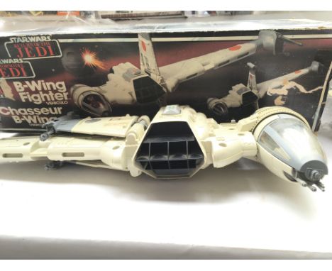 A Vintage Boxed Star Wars B-Wing Fighter. (Box is warn).