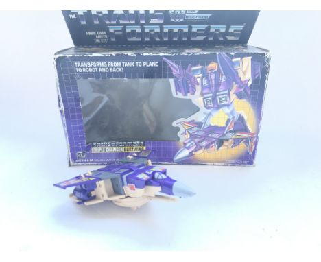 A Boxed Vintage Transformers Triple Changer Blitzwing.