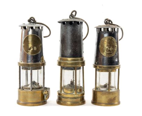 THREE MINER'S SAFETY LAMPS, including 2x Type S1 lamps by The Protector Lamp & Lighting Co. Ltd. with brass labels numbered 2