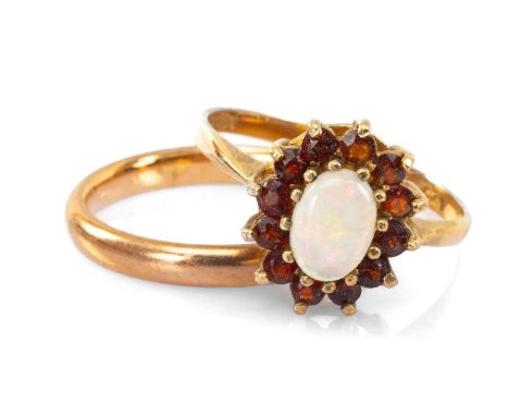 TWO 9CT GOLD RINGS comprising 9ct gold band and a 9ct gold opal and garnet cluster ring, 4.9gms gross (2)Provenance: private 