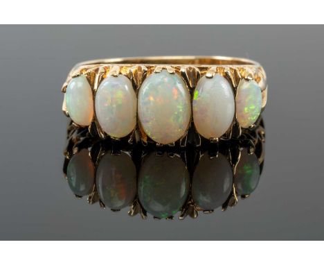 9CT GOLD FIVE STONE OPAL RING, having five graduated oval opals, ring size O, 3.4gmsProvenance: private collection North West