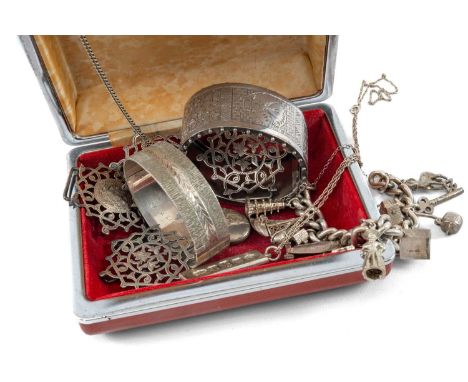 ASSORTED SILVER JEWELLERY comprising two silver pierced nurses buckles, silver bangle and similar white metal wide bangle, si