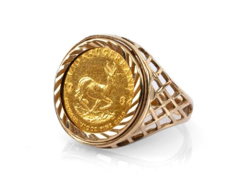 1984 1/10 OZ KRUGERRAND COIN in 9ct gold pierced ring mount, ring size O, 6.4gmsProvenance: private collection North West Eng