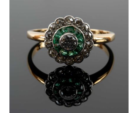 YELLOW METAL DIAMOND & EMERALD HALO RING, the shank engraved with initials and date '11.7.11', ring size L 1/2, 2.2gms in Air