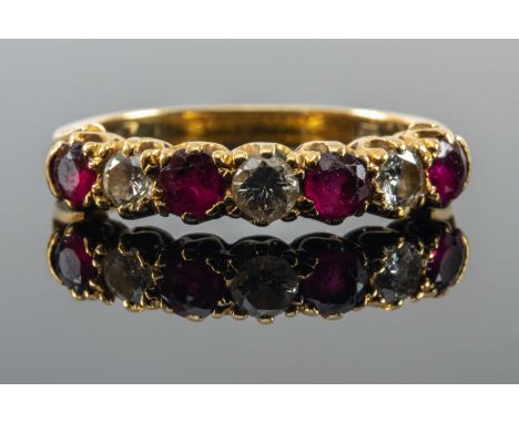 18CT GOLD SEVEN STONE DIAMOND & RUBY RING, ring size N 1/2, 3.1gms in vintage T. & D. G Lloyd of Lampeter ring boxProvenance:
