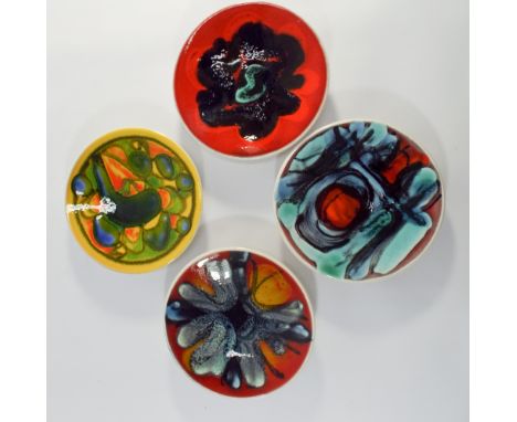 Four Poole Pottery Delphis Studio circular pin trays shape No 49