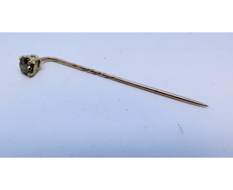 Cinnamon diamond set stick pin, diamond weight 0.62 ct. 