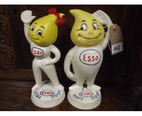 A pair of cast iron Esso money boxes 