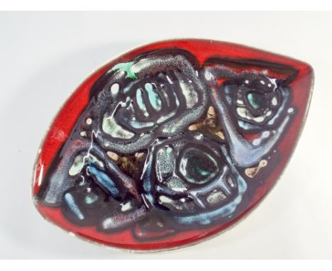 A Poole Pottery Delphis Studio leaf plate shape No 91 painted in dark reds and blacks