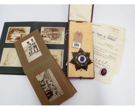A box silver gilt order of El Rafidain first class military set insignia, enamel breast star in its box of issue, together wi