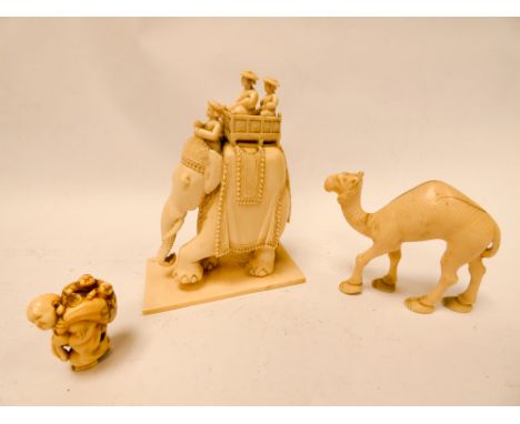 Late 19th century carved Indian ivory elephant, small Japanese netsuke and a carved ivory camel. Elephant height 12 cm 