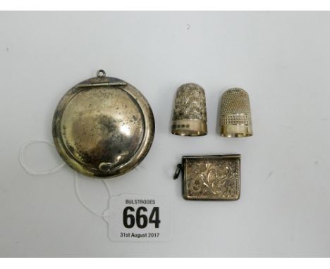 Two hallmarked silver thimbles, silver envelope stamp case and a hallmarked silver ladies compact inset mirror to the lid, Bi