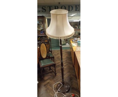 A mahogany column standard lamp and shade - failed PAT test