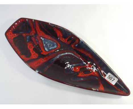 A Poole Pottery Delphis Studio leaf plate shape number 82 in deep red and blue colours 