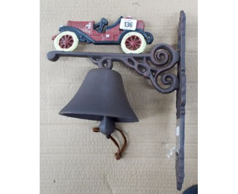 a vintage car shaped wall hanging bell