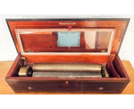 A 19th century music box by Nicole Freres, playing 8 airs in inlaid rosewood case, working.     Good condition for age, in go