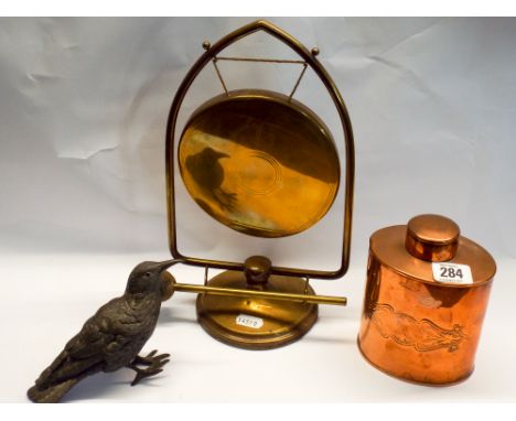 Small brass gong, copper tea caddy and a bird ink stand 