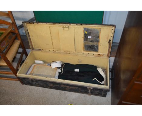 An officer's tin trunk named to Captain J.B. Evans with two Scottish military jackets and various other military items