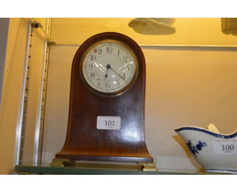An Edwardian mahogany and inlaid mantel clock (the dial AF)