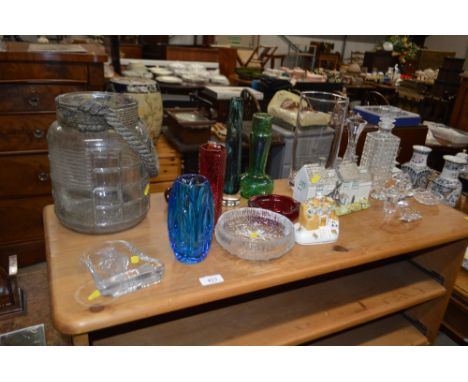 A quantity of various decorative glassware, a model house, decanter, etc.