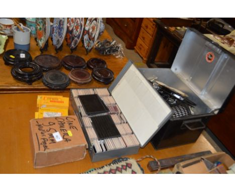 A Pathoscope in tin; together with a quantity of slides and a cine camera 