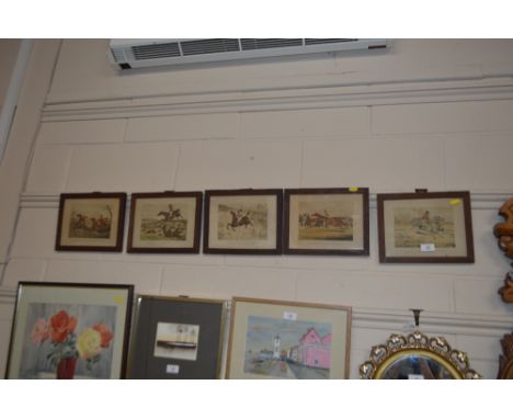 A set of four oak framed humorous coloured hunting prints; together with a coloured horse racing print 