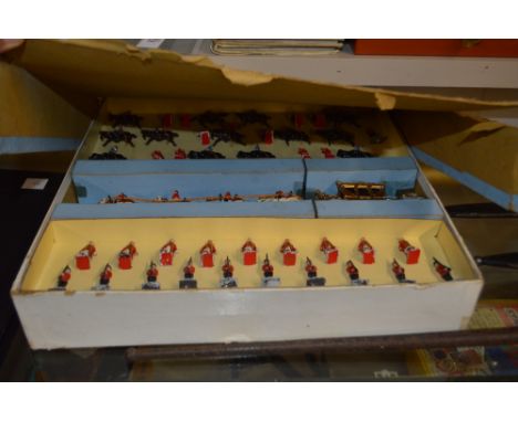 A Johillco Product metal toy set on the form of a coronation carriage and figures