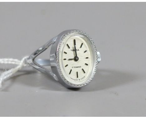 A Russian Yanka white metal ring set with a  manual watch to the shank.