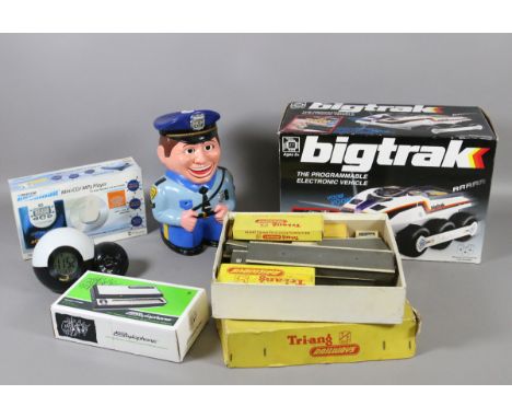 A cookie jar in the form of an American cop, retro alarm clock, big track toy vehicle, Triang railway accessories, boxed, etc