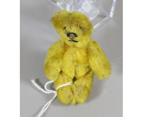 A miniature mohair jointed Steiff style bear.