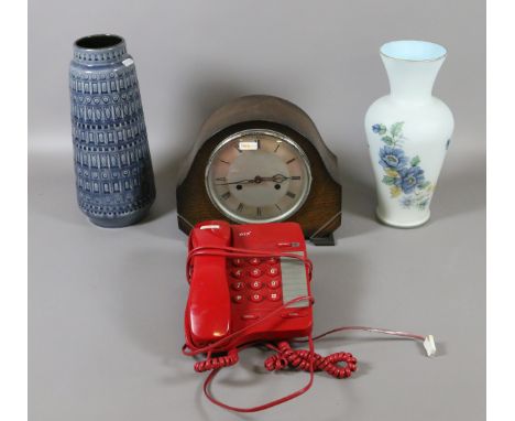 A Smiths oak cased mantel clock chiming on a coiled gong along with a red BT push button telephone, a West German pottery vas