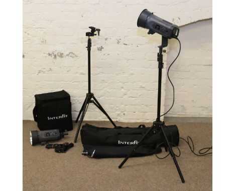 An Interfit Colorflash 150 i studio lighting kit in carry bags.