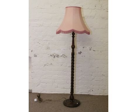 A mahogany barleytwist standard lamp.