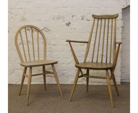 Two stripped beech and elm Ercol spindle back chairs.