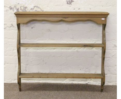A pine two tier wall shelf.