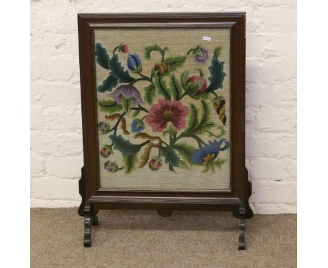 An oak framed tapestry firescreen.