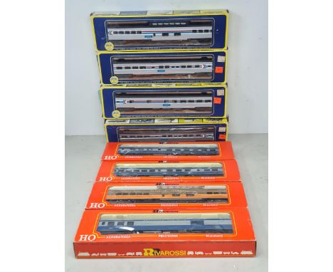 Thirteen boxed Rivarossi HO scale Coaches, an unboxed Rivarossi Coach and four boxed AHM HO scale Coaches 