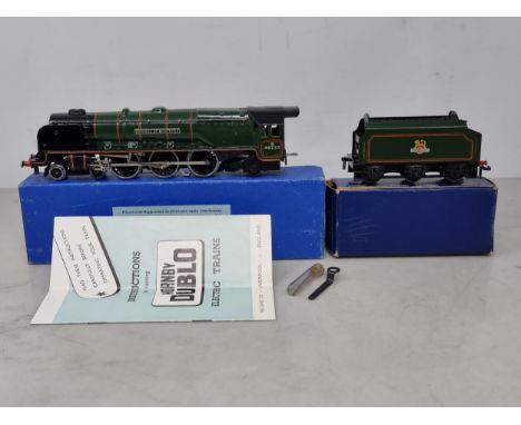 A boxed Hornby Dublo EDL12 gloss 'Duchess of Montrose' Locomotive, unused. Locomotive shows no signs of use to pick ups, whee