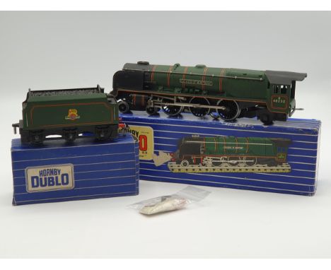 A rare boxed Hornby Dublo L12 'Duchess of Montrose', unused and in mint condition. Showing no signs of use to the pick ups, w
