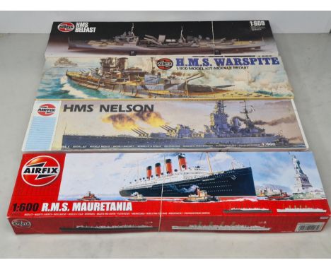 Four boxed Airfix 1:600 scale plastic Kits of Ships including HMS Belfast, HMS Warspite, HMS Nelson and RMS Mauretania 